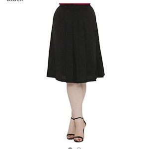 Black pleated A line skirt by Voodoo vixen